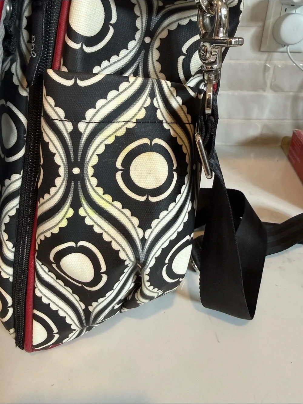 Petunia Pickle Bottom Black & White Geometric Baby Bag with Red Accent